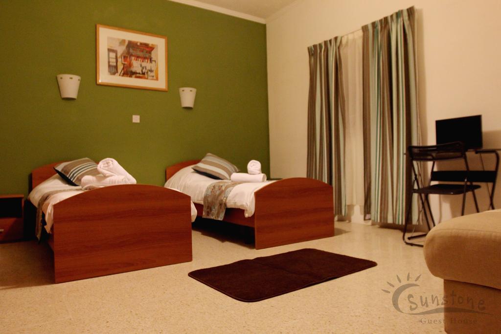 Sunstone Boutique Guest House Buġibba Værelse billede