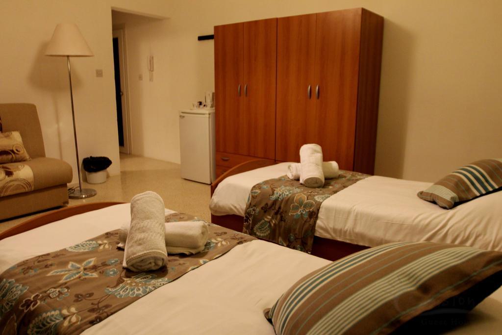 Sunstone Boutique Guest House Buġibba Værelse billede